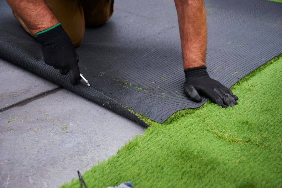installing fake grass
